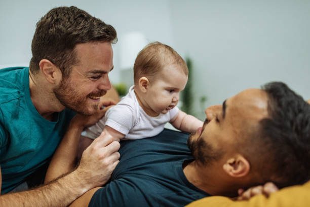 Gay couple experiencing quarantine and lockdown. Gay family in lockdown
